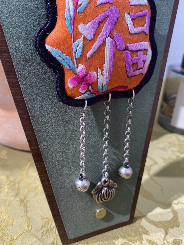 Handmade Miao embroidery silver brooch - orange background with Fu character pattern and tassels - Image 3
